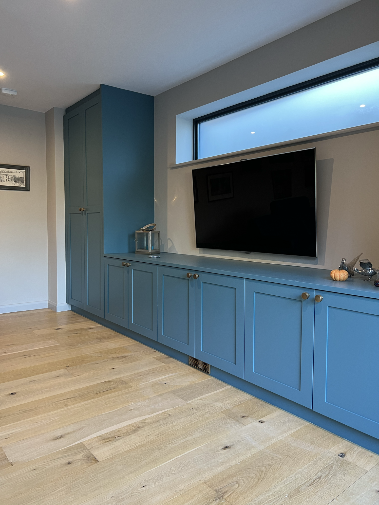 Large media wall - built-in cupboards and tv unit