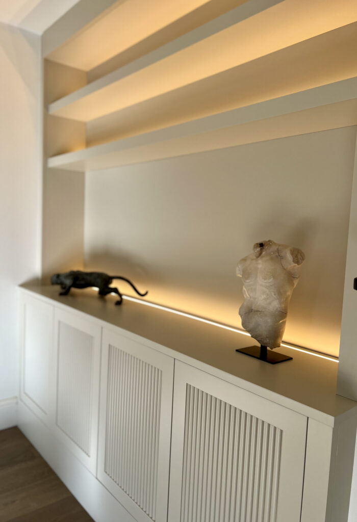 WHY IS CUSTOM-MADE ALCOVE FURNITURE THE BEST CHOICE VS FLAT-PACK? bespokepaintedalcovecupboardswithreededdoors scaled